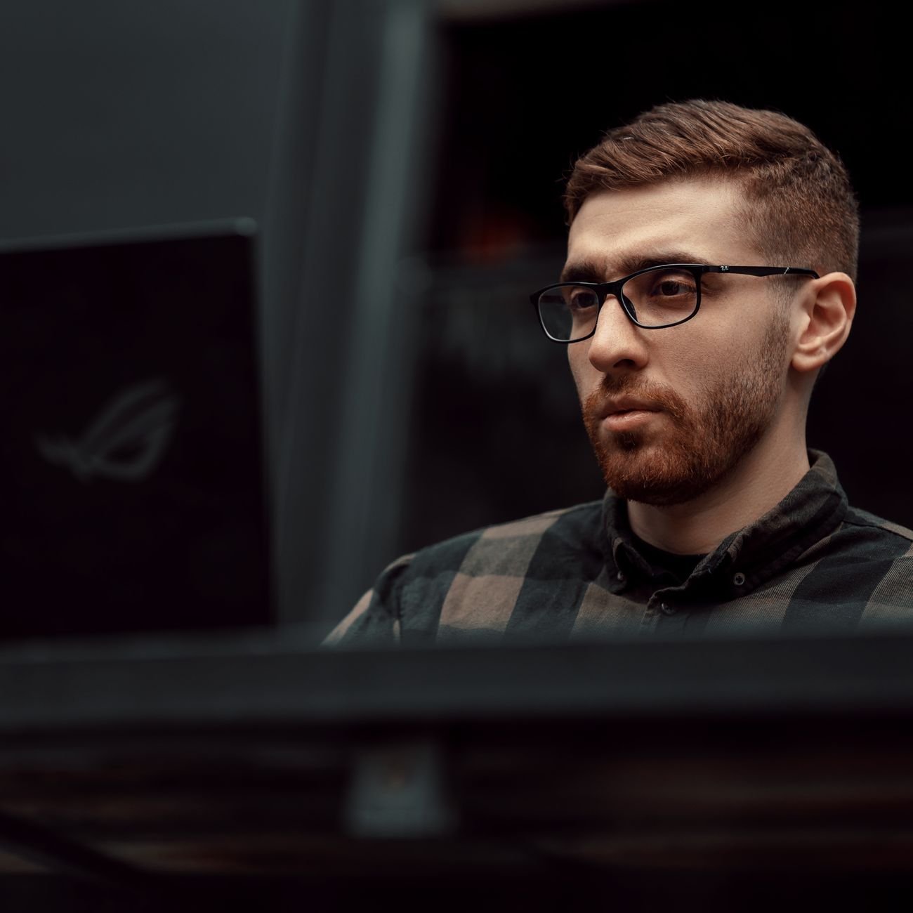 Focused man working at laptop